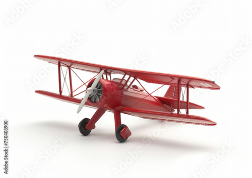 Plastic model of a toy biplane on a white background.