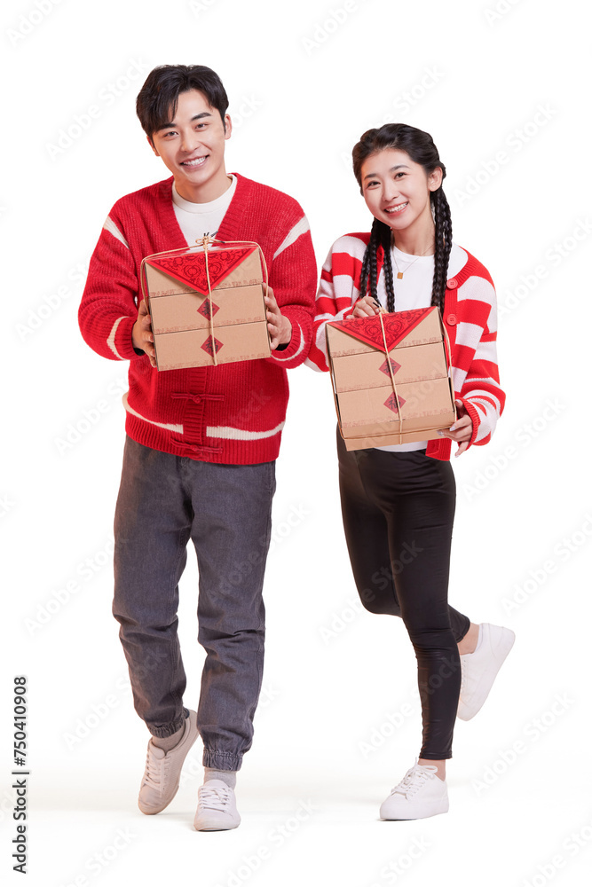 Happy young couple celebrating Chinese new year Happy young couple celebrating Chinese new year