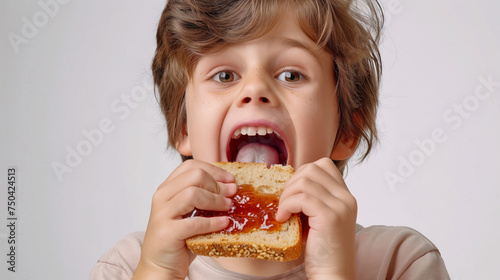 Kid enjoying bread with jam