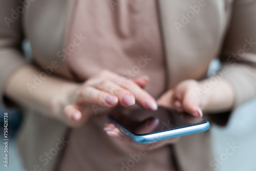 business woman touching the mobile phone