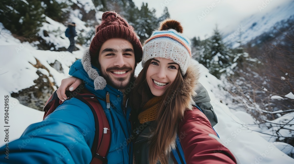 A selfie of couple man and woman on snow mountain outdoor activity adventrue.