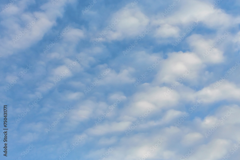 Blue sky background with tiny clouds. Atmosphere background or wallpaper Blue sky background with tiny clouds. Atmosphere background or wallpaper