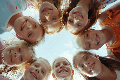Circle of Joy: Group of Happy Children Lying Down with Heads Together