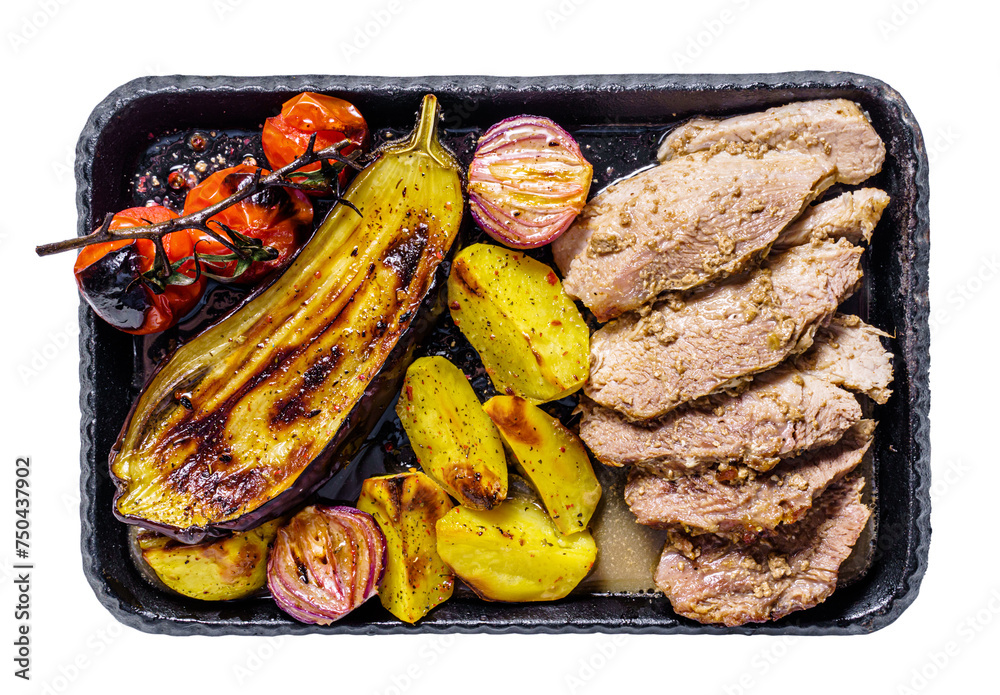 Grilled vegetables with meat on a cast iron trey isolated Grilled vegetables with meat on a cast iron trey isolated