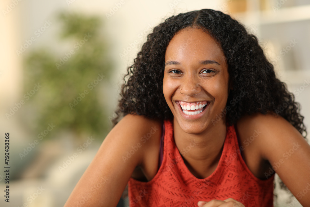 Happy black woman with perfect smile looking at you Happy black woman with perfect smile looking at you
