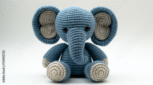 Blue Knitted Toy Elephant on a White Background