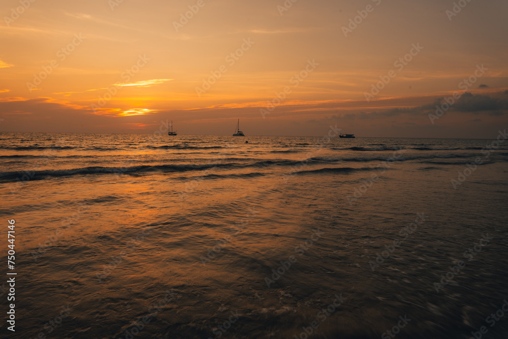 Orange beach at summer dusk on the island