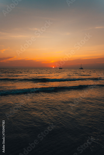 Orange beach at summer dusk on the island