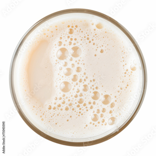 Top-down view of pure and unadorned horchata in a glass isolated on a white background. Traditional Mexican drink concept for menu and beverage design