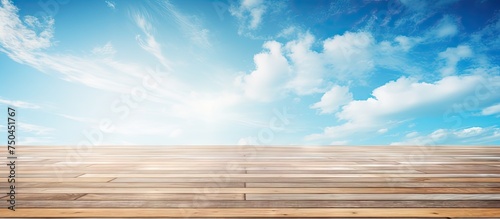 Serene Blue Sky Background Contrasting with Elegant Wooden Floor for Calm Ambiance