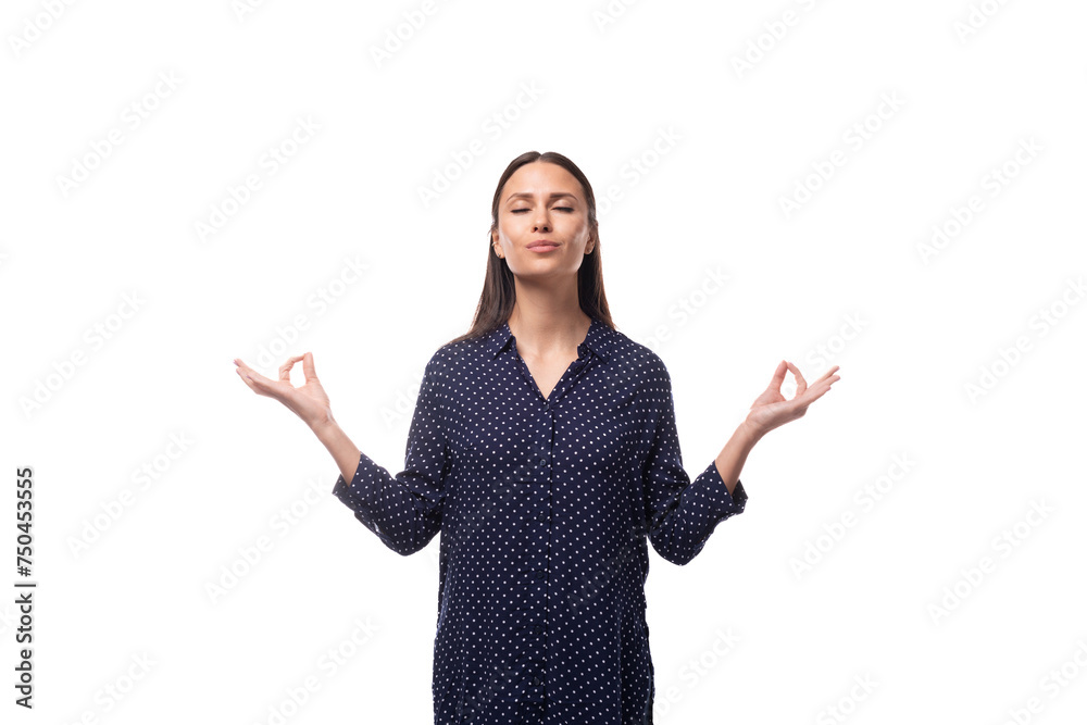 young stylish brunette woman in a blue blouse is confident young stylish brunette woman in a blue blouse is confident
