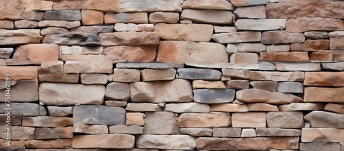 Rustic Stone Wall Texture - Natural Rock Surface Background in Earthy Colors