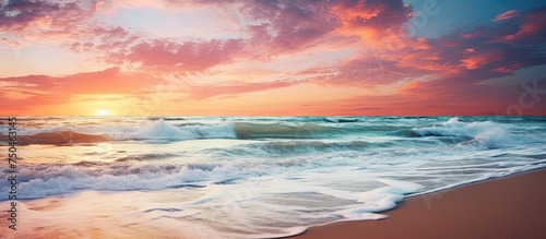 Painting in the Sand: Majestic Colors of a Beach Sunset with Dramatic Waves