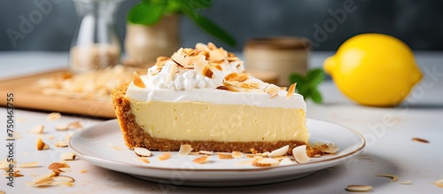 Delicious Homemade Keto Lemon Cream Pie Served on Plate with Almond Coconut Crust photo