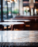 Empty marble table, blurred restaurant background with copy space