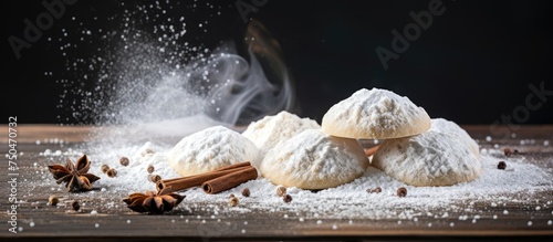 Delicious Eid Cookies: A Festive Pile of Powdered Dough with Cinnamon Sticks and Spices photo