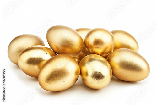 Heap of golden eggs with a soft glow on a plain white backdrop.