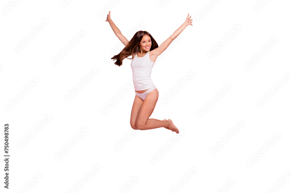 Good morning! Full length size body young gorgeous nice straight-haired lady wearing sleepwear, jumping in air, raising hands up. Isolated over pink pastel background