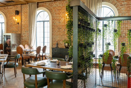 Restaurant interior with plant green wall