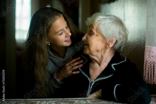 A  teen girl visits her old grandmother.