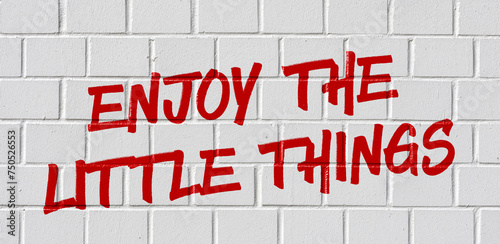  Graffiti on a brick wall - Enjoy the little things
