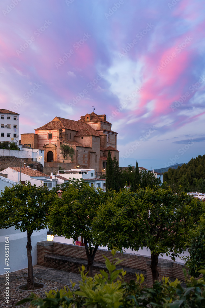 Old church on top of a hill, by the las light of the day in Andalusia.