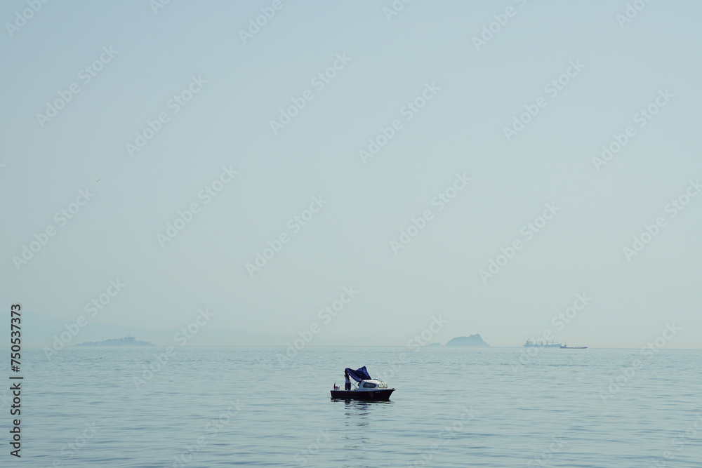 Small fishing boat on open water