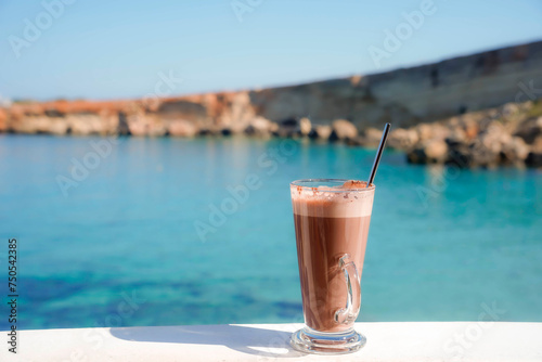chocolate shake and coffee on the beach. Refreshment in summer vacation