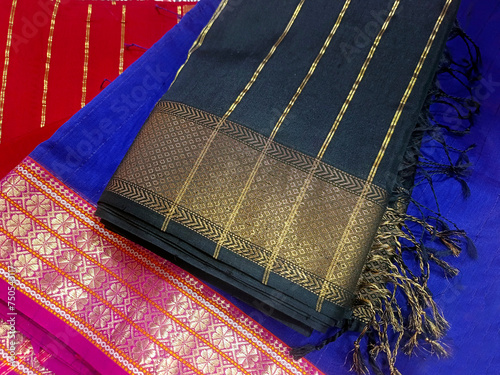 Hand Weaving Silk & Handloom Sarees, saree with golden details, woman wear on festival, ceremony and weddings, expensive sarees are famous for their gold and silver zari, brocade. Incredible India. photo