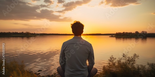 Man enjoys serene sunset over water feeling small yet connected to nature. Concept Sunset Over Water, Serene Moments, Connection with Nature, Reflection, Peaceful Contemplation