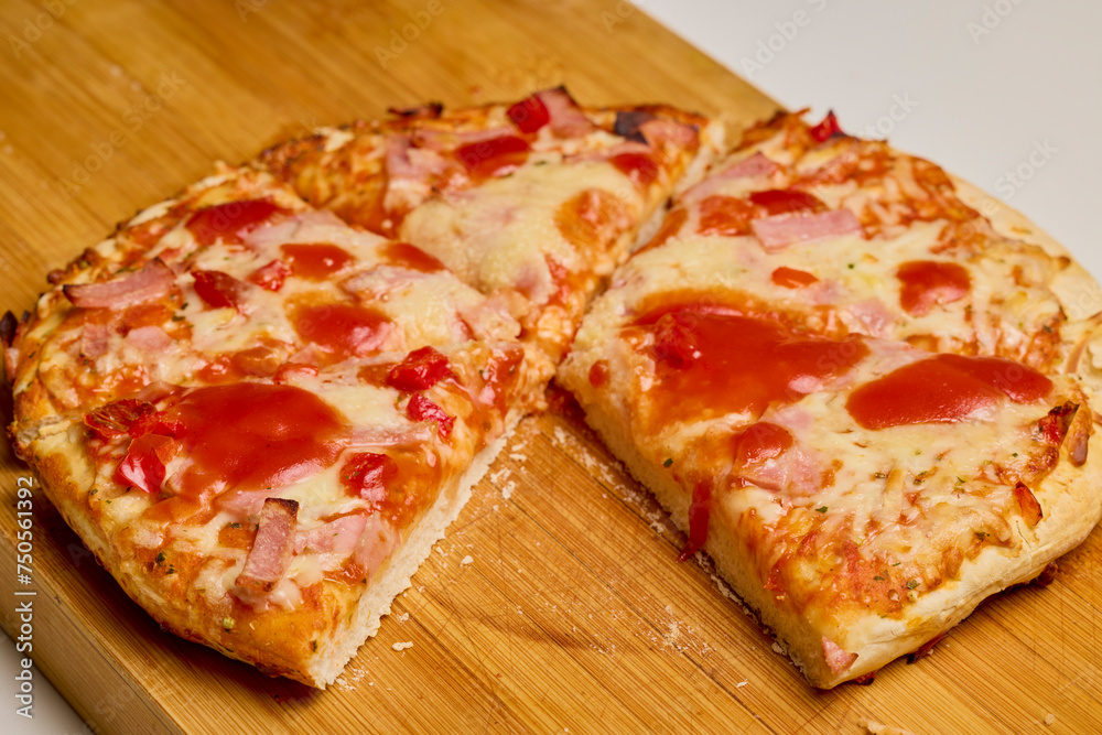 pizza cooked on a wooden board