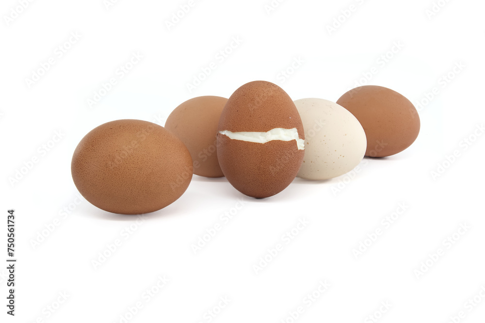 Eggs with varying colors, one egg cracked during boiling Eggs with varying colors, one egg cracked during boiling