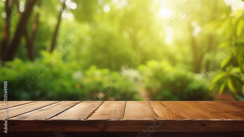 Wooden table and blurred green nature forest background © Yellow
