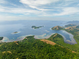 Tropical Islands with mountain hill and forest. Blue sky and clouds. Coron, Palawan. Philippines.