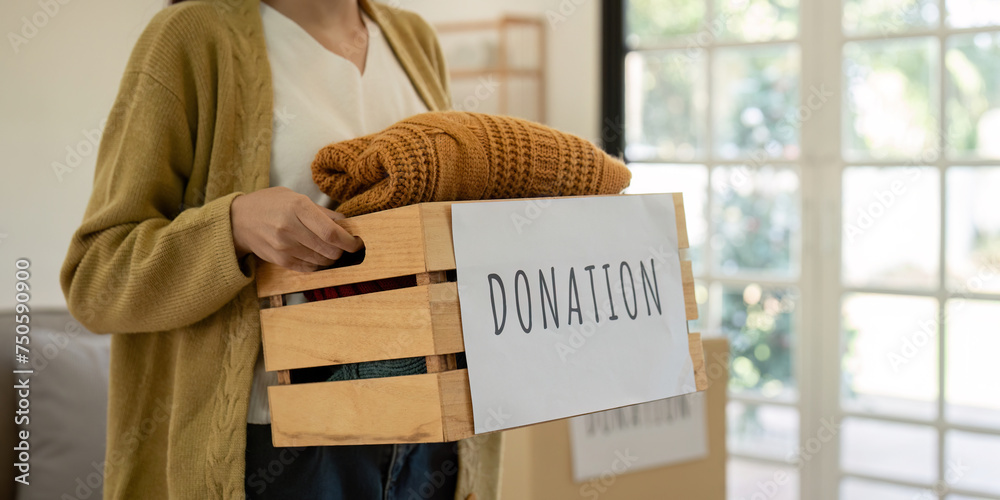 Helping Objects Donation, asian young woman sitting pack object at home, putting on ...