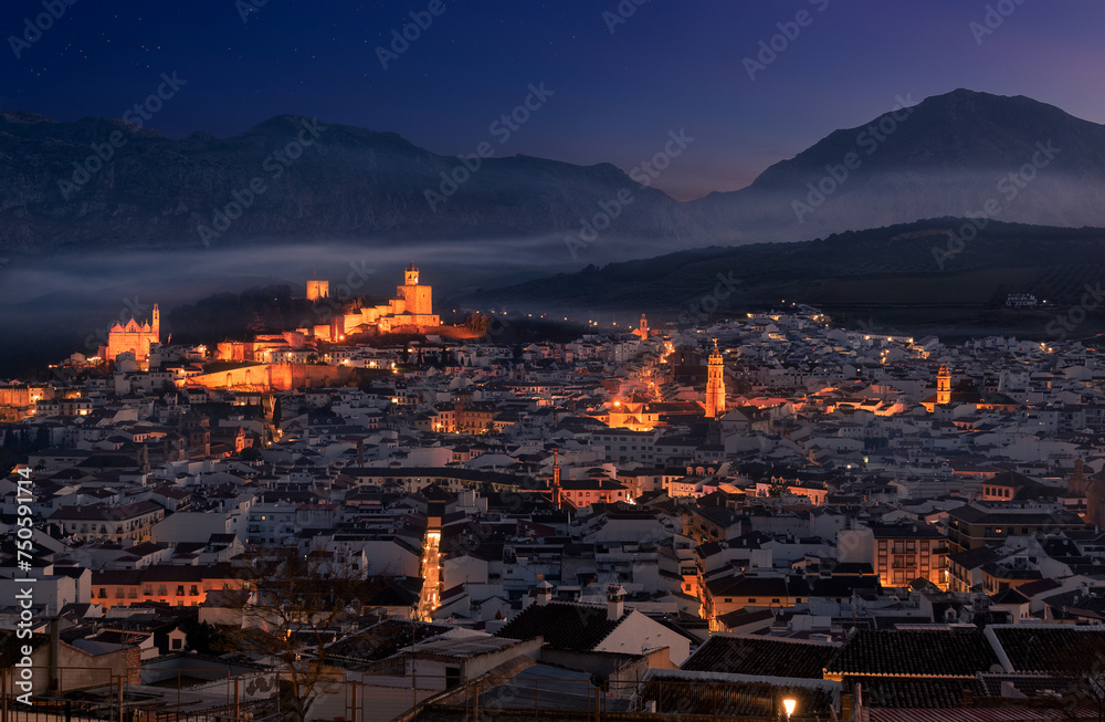 Panorama of the city of Antequera ona misty twilight Panorama of the city of Antequera ona misty twilight