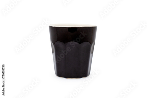 Dosing cup made of black porcelain.