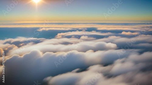 Morning marvel: azure heavens kissed by sun-kissed clouds, a celestial ballet unfolding in dawn's embrace. Weather concept. Stock footage. Time lapse. Sky background. 4K UHD.
