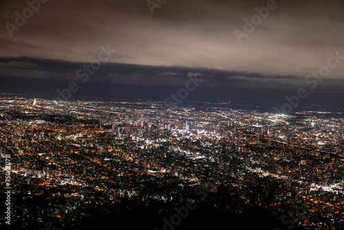 Night cityscape of Sapporo town from the mountain Mt. Moiwa on observation point. © chayakorn