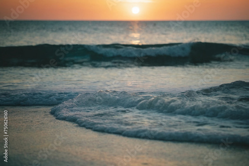 sunset on the beach with sea