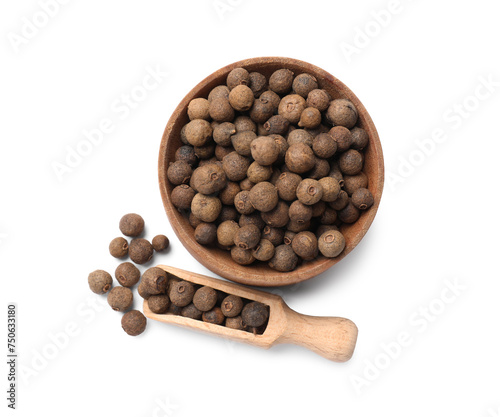Dry allspice berries (Jamaica pepper) in bowl and scoop isolated on white, top view