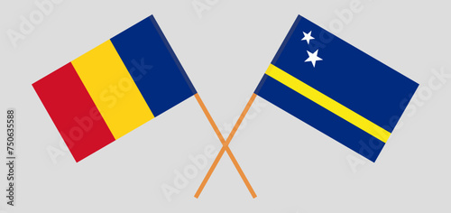 Crossed flags of Romania and Country of Curacao. Official colors. Correct proportion