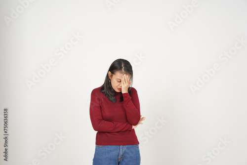 Young Asian woman in Red t-shirt Suffering Headache gesture  isolated on white background © Sino Images Studio