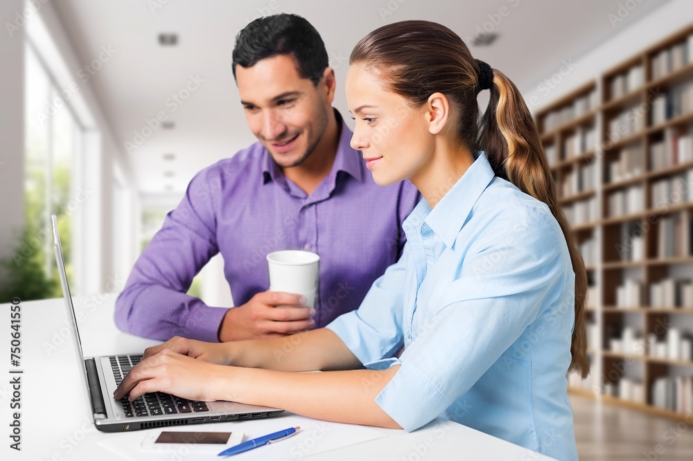manager teaching young worker discussing strategy manager teaching young worker discussing strategy