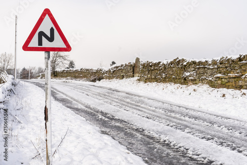 Road sign on a country road in Northumberland, UK in winter
