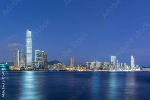 Panorama of skyline of Victoria harbor of Hong Kong city at dusk © leeyiutung