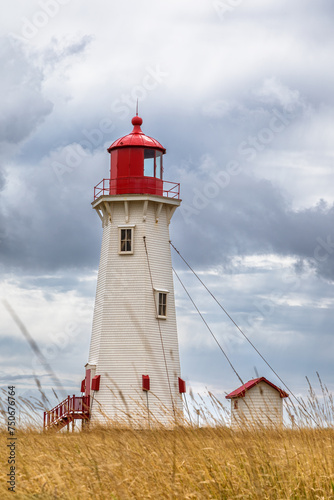 The Anse a la Cabane, or Millerand lighthouse of Havre Aubert, in Iles de la Madeleine, or the Magdalen Islands, Canada. This is the tallest and oldest working lighthouse of the archipelago.