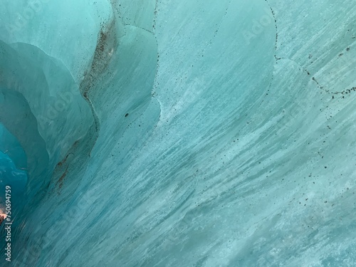 Ice cave on the Mer de Glace glacier, in the Chamonix Mont Blanc massif, Alps, France photo