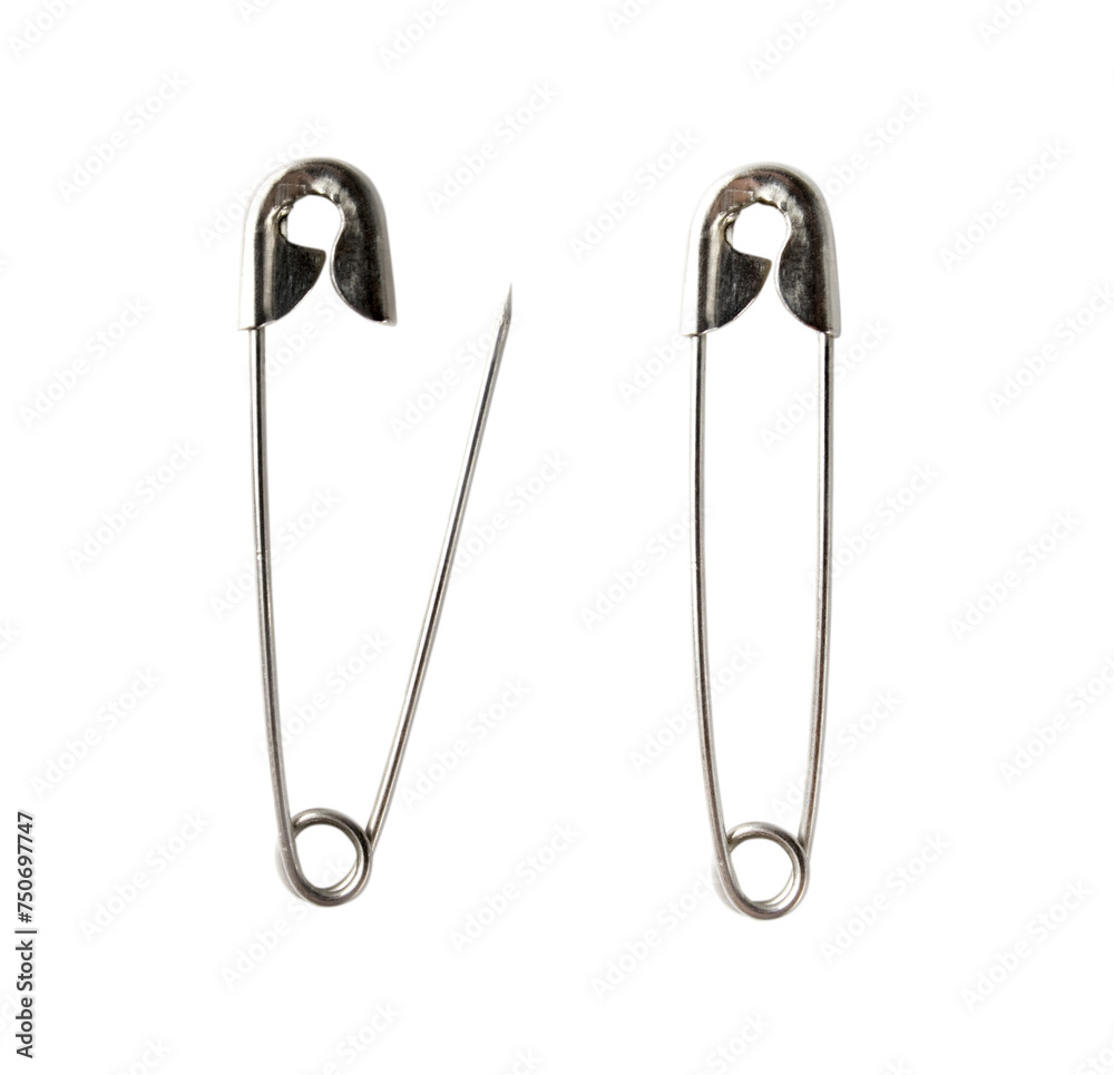 Safety pins isolated on the white background Safety pins isolated on the white background