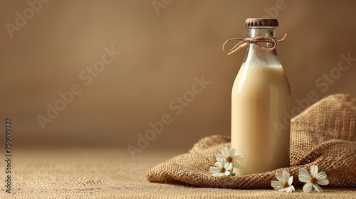 glas bottle of milk on a plain studio background - product photo with copy space